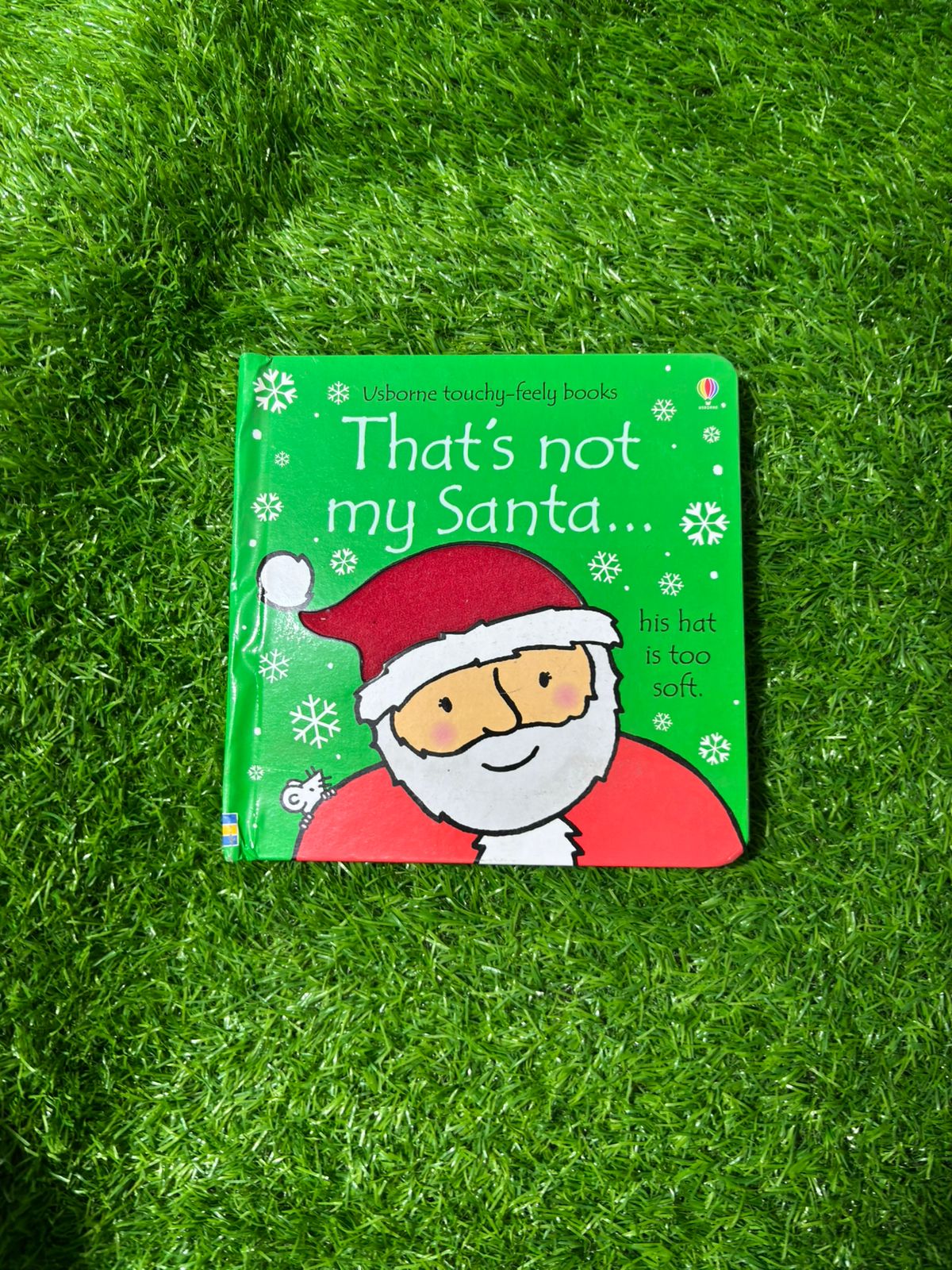 That's not my santa...: An Interactive, Sensory Touchy-Feely Holiday Book with Tactile Patches for Babies and Toddlers